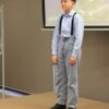 uczestnik konkursu recytuje wiersz przed jury i publicznością