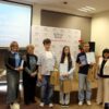 Grupowe zdjęcie zawodników drużyny zajmującej 1 miejsce z organizatorami.